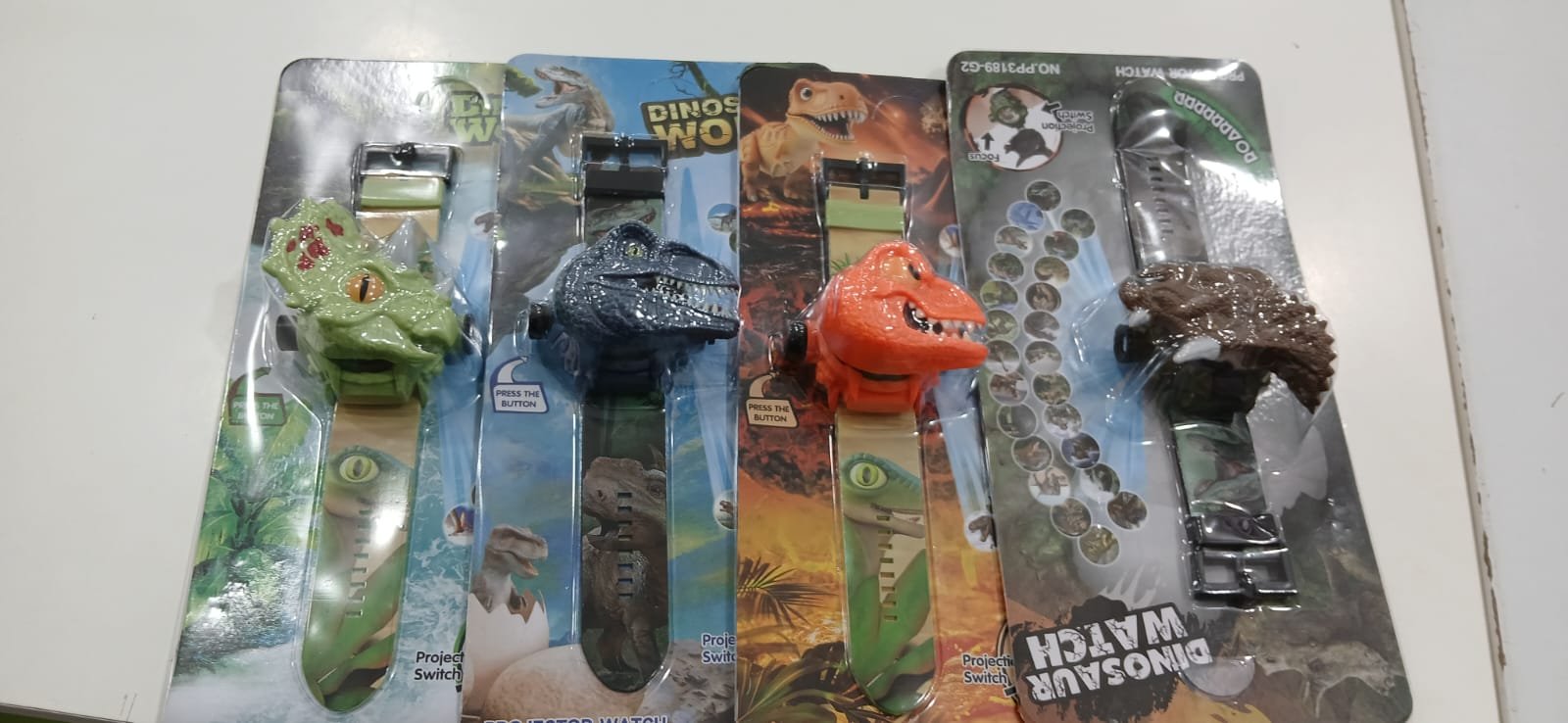 RELOJ INFANTIL - CON PROYECTOR DINOSAURIO MODV-00I2